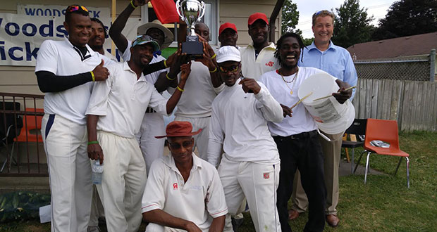 The victorious Woodstock Cricket Club side with the winning trophy. Mayor Trevor Birch is at extreme right (standing). (Pictures by Frederick Halley).