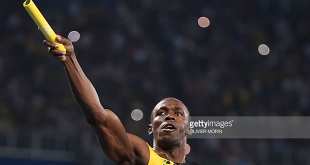 Jamaica's Usain Bolt celebrates after Team Jamaica won the Men's 4x100m Relay Final during the athletics event at the Rio 2016 Olympic Games at the Olympic Stadium in Rio de Janeiro last night. / AFP / OLIVIER MORIN (Photo credit should read OLIVIER MORIN/AFP/Getty Images)
