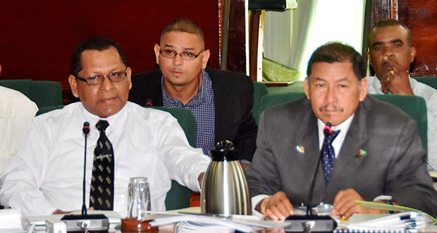 Attorney David James, left, and Minister Sydney Allicock during Wednesday’s meeting of the Parliamentary Select Committee on Natural Resources