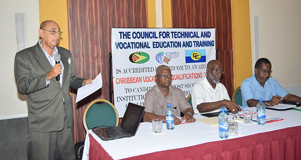 TVET Consultant Mr. John Seeram presenting the TVET Draft Financing Strategy to the Stakeholders’ Consultation Meeting at the Guyana Pegasus on Wednesday. Seated from left are: Senior TVET Officer Mr. Jerry  Simpson; Technical Facilitator Mr. Vincent Alexander; and Chairman Dr. Leyland Thompson, of the Faculty of Education and Humanities, University of Guyana