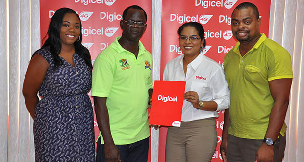 Digicel’s Communications manager Vidya Sanichara (right) hands over the donation to chairman of the Boyce and Jefford Committee Colin Boyce while flanked by co-chairman Edison Jefford (right) and Digicel’s Events and Sponsorship executive Louanna Abrams.
