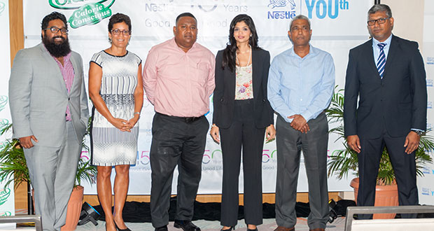 Nestlé representatives and distributors who have already pledged their support to the Alliance for YOUth Initiative. They are, from left: Beepat’s CEO, Mr. Kristofer Beepat; Nestlé Corporate Communications Manager, Ms. Denise d’Abadie; DSL Operations Manager, Mr. Bryan Prittipaul; Nestlé Human Resources Manager, Ms. Kristen Ramlogan; Commercial Director, Massy Distribution, Mr. Navin Thakur; and Sales Manager, Nestlé Caribbean International, Mr. Sudesh Mahase (Photo by Delano Williams)