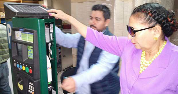 Mayor Patricia Chase-Green inspecting a parking meter in Mexico City last June
