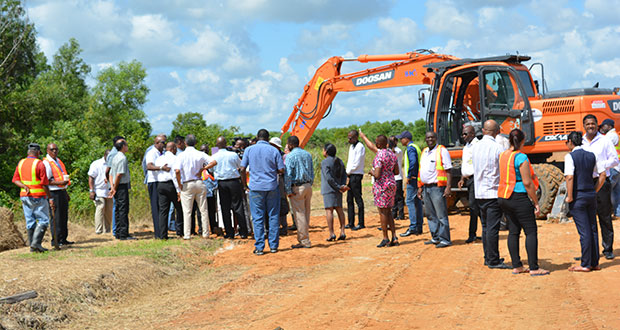 Stakeholders traversing the site where the state-of-the-art hangar will be constructed