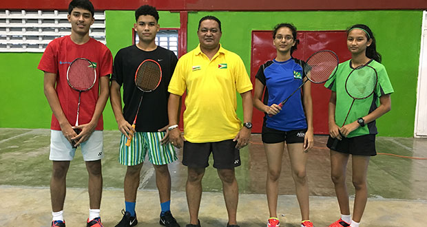Badminton coach Gokarn Ramdhani, with Guyana’s four-member junior team.
