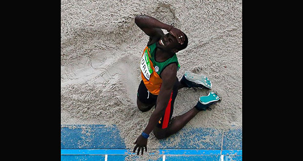 Guyana's Troy Doris reacts to a jump in the triple jump final yesterday.