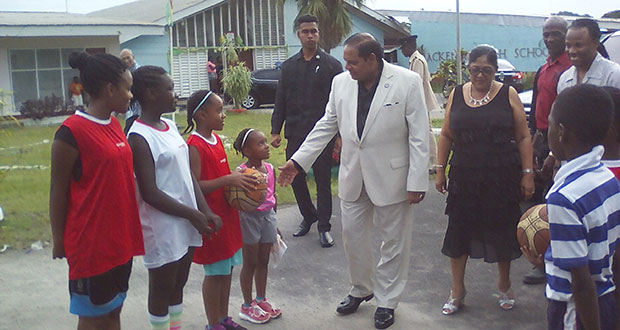 PM Nagamootoo about to be introduced to youngest girl at the camp,Khadi Layne