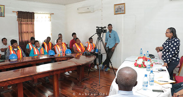 Social Protection Minister Volda Lawrence addressing in Mahdia the trainees who are now participating in the Heavy Duty Equipment Operators Training Programme