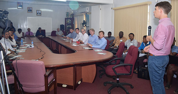 Team Leader Joost Remmers makes a presentation on Project Georgetown Drainage in the boardroom of the Agriculture Ministry