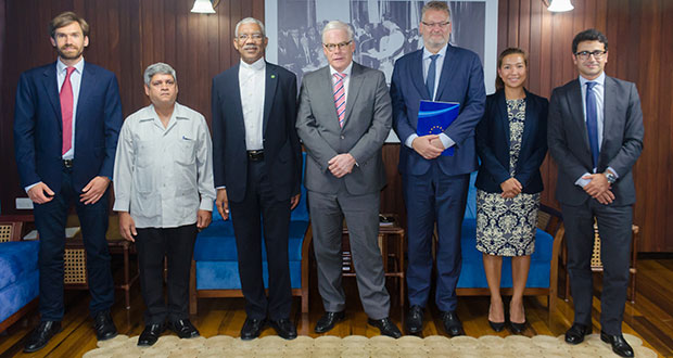 President David Granger (third from left) along with EIB Vice-President Pim van Ballekom (on the right) and Minister within the Ministry of Finance Jaipaul Sharma on the left. Also in photo are other members of the delegation