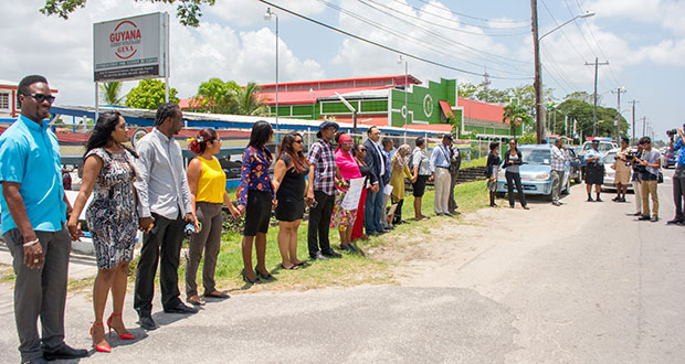 GPA Executives with backing from the Women and Gender Equality Commission, reporters, cameramen and human rights activists protesting NCN