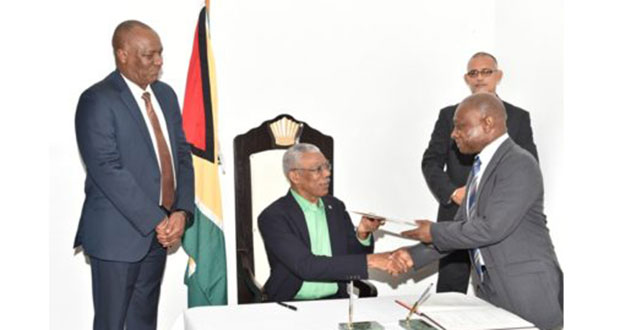 L-R: Minister of State Joseph Harmon, President David Granger, Minister Carl Greenidge and partly hidden is Director of Protocol, Ministry of the Presidency, Col. Francis Abraham.