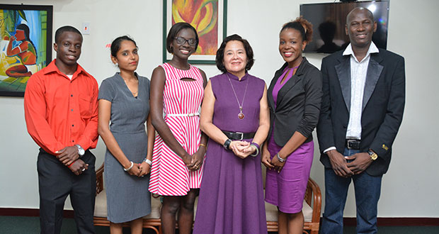 First Lady Sandra Granger with the Commonwealth scholarship awardees. From left: Joel Flatts, Bibi Abrahim, Olita Williams, Granger, Corrissa Goodings and Trishawn McGreggor