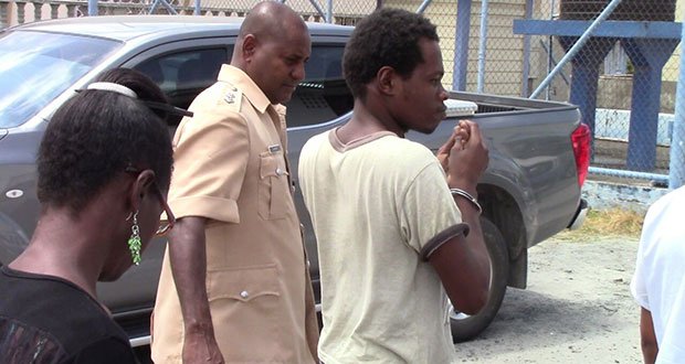 A handcuffed Shemroy Hackette before he entered the Magistrate’s court