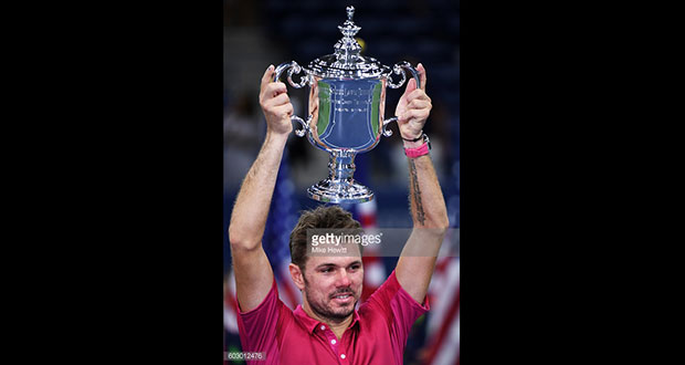Stan Wawrinka of Switzerland celebrates with the trophy after defeating Novak Djokovic of Serbia with a score of 6-7, 6-4, 7-5, 6-3 during their Men's Singles Final Match on Day Fourteen of the 2016 US Open at the USTA Billie Jean King National Tennis Center yesterday.(Photo by Mike Hewitt/Getty Images)