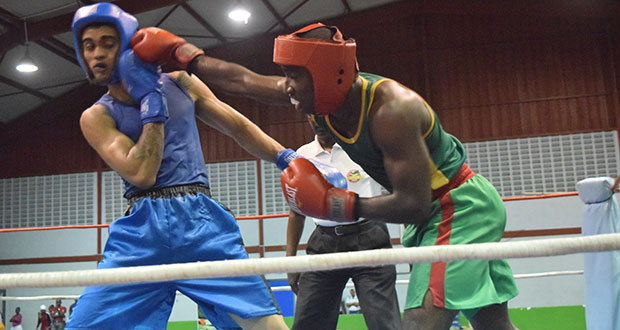 Part of the action between Guyana Defence Force and Republican on Saturday evening at the National Gymnasium (Cullen Bess-Nelson photo).