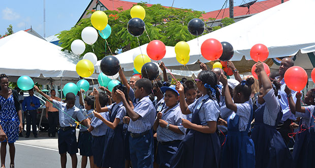 File photo of children of the Winfer Garden Primary School as they prepare to release their balloons into the air at the launch of education month yesterday