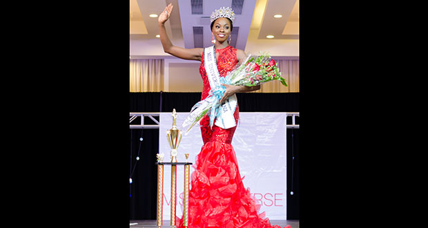Soyini Fraser waves to the crowd after being crowned Miss Guyana Universe 2016