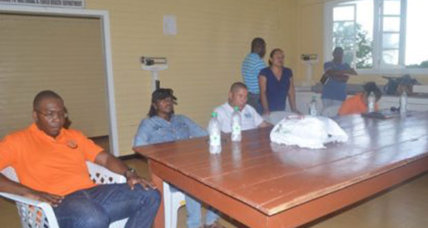 From left to right, Dr. Horace Cox, Director of Vector Control, Dr. Kay Shako – Director, Regional Health Services, and Dr. George Norton, Minister of Public Health. The Minister was meeting with staff of the Kumaka District Hospital, where the issue of water transportation to the region was raised