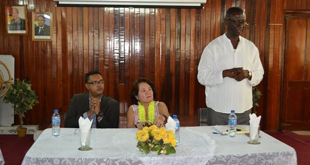 Regional Executive Officer, Mr. Rupert Hopkinson delivering his remarks at the opening of the Self-Reliance and Success in Business Workshop. Also in photo is First Lady, Mrs Sandra Granger and another official of the region