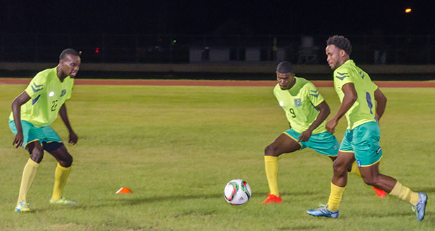 Golden Jaguars (L to R) Daniel Wilson, Dwight Peters and Vurlon Mills getting warmed up before training started last night.