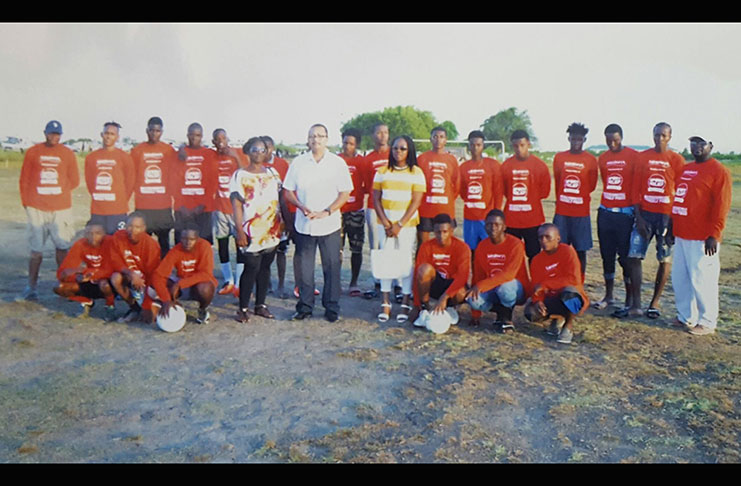 L-R front row, Yvette Price, Anthony Price, Joycelyn Maxwell Price flanked by members of Trivalta FC