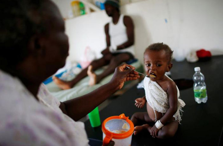 People are treated at a cholera treatment centre at a hospital after Hurricane Matthew had passed through Jeremie, Haiti, October 11, 2016 (REUTERS/Carlos Garcia Rawlins)