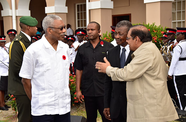 Prime Minister Moses Nagamootoo engages President David Granger and Speaker Dr Barton Scotland at the event