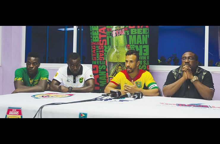 Coach Shabazz (right) with Guyana’s captain and Jamaica’s coach and captain at a press conference