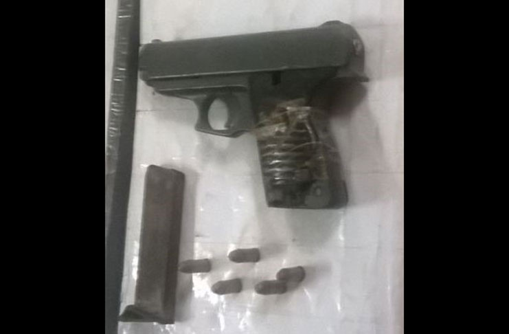 The .32 pistol and ammunition found by police on the suspect’s person