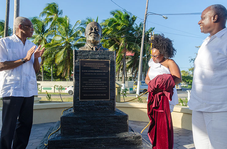 President David Granger (left) and Ms. Vanessa Merriman-Harding, daughter of the late Claude Merriman and his son, Hon. Justice Courtney A. Abel, shortly after unveiling the bust. [Delano Williams photo]