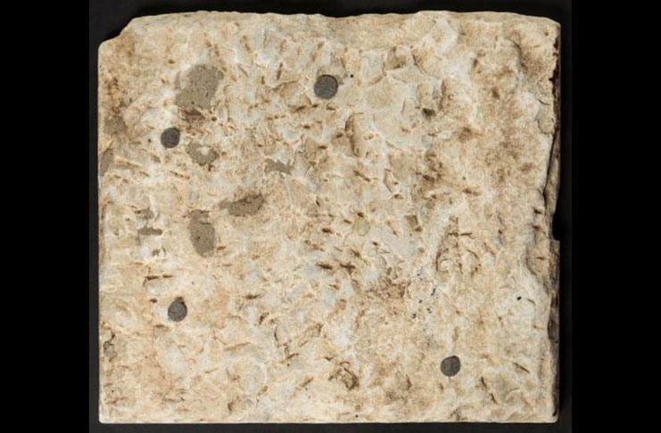 A stone tablet thought to be about 1,500 years old with a, worn-down chiseled inscription of the Ten Commandments is seen in this photo released in Dallas, Texas, U.S., October 21, 2016. Courtesy Heritage Auctions/Handout via REUTERS