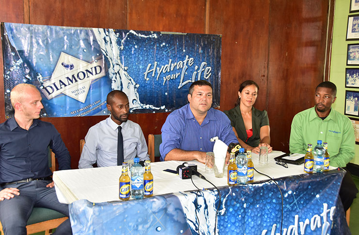 from L toR: Ansa McAl Beverage Marketing Manager Robert Hiscock, DDL Brand Executive Larry Wills, Guyana Hockey Board President Philip Fernandes, and members Tricia Fiedtkou and Devin Hooper  (Adrian Narine Photo)