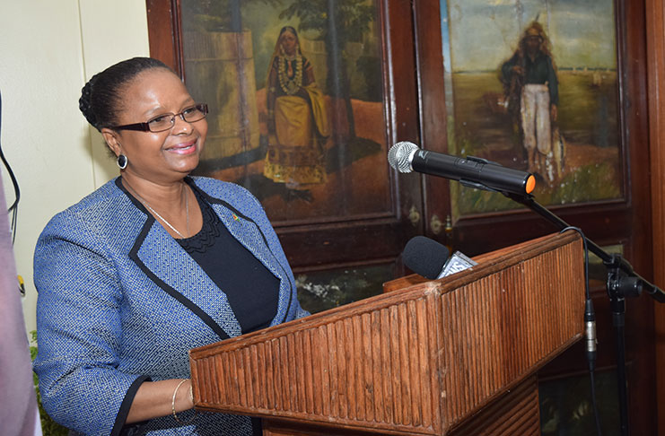 Social Protection,The Hon. Volda Lawrence, addresses the gathering at the Launch of the USAID/Eastern and Southern Caribbean Youth Empowerment Services (YES).