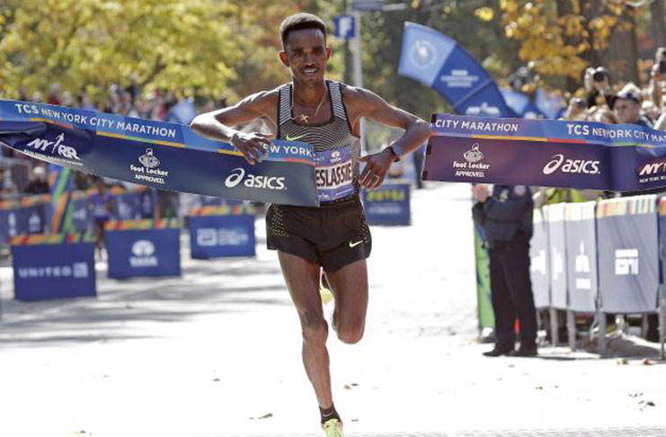 Ghirmay Ghebreslassie of Ethiopia crosses the finish line to win the men’s field of the 2016 New York City Marathon in Central Park in the Manhattan borough of New York City, New York., REUTERS/Mike Segar