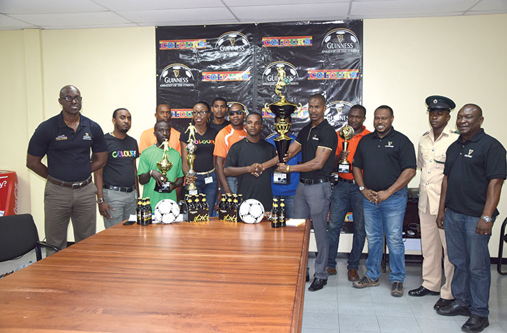 Guinness representatives stand with various team officials and the organising committee at the launch of the 6th Colours/Guinness Greatest of the Streets football tournament.