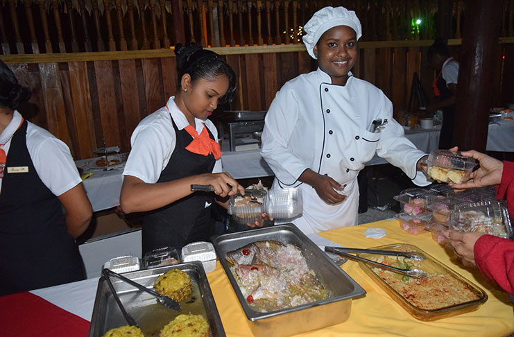 One of the Carnegie chefs handing out rice treats