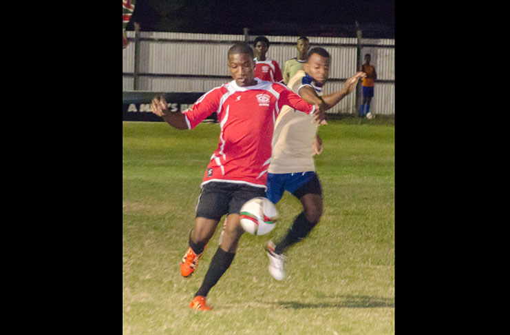 Part of the action in the match between Buxton United and  Monedderlust FC  on Friday night. (Delano Williams photo)