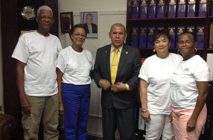 Some members of the visiting medical team with Health Minister, Dr George Norton (centre). They are from left, Mr Conrad Joseph, Ms Yvonne Triesman (President), Ms Patricia Stoll and Ms Marleen Joseph