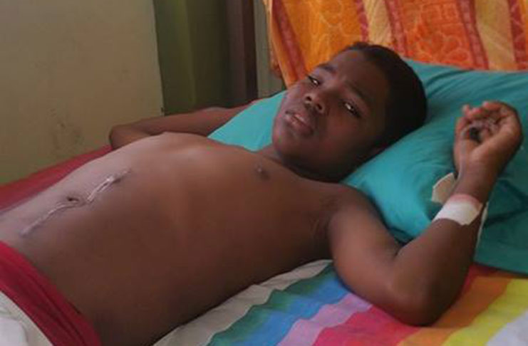 Thirteen-year-old Jonathan Ashby minutes before he was rushed into the operating room to undergo a third surgery