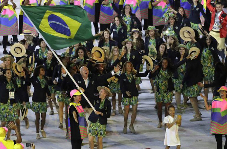 Yane Marques carries the flag of Brazil during the opening ceremony for the 2016 Summer Olympics