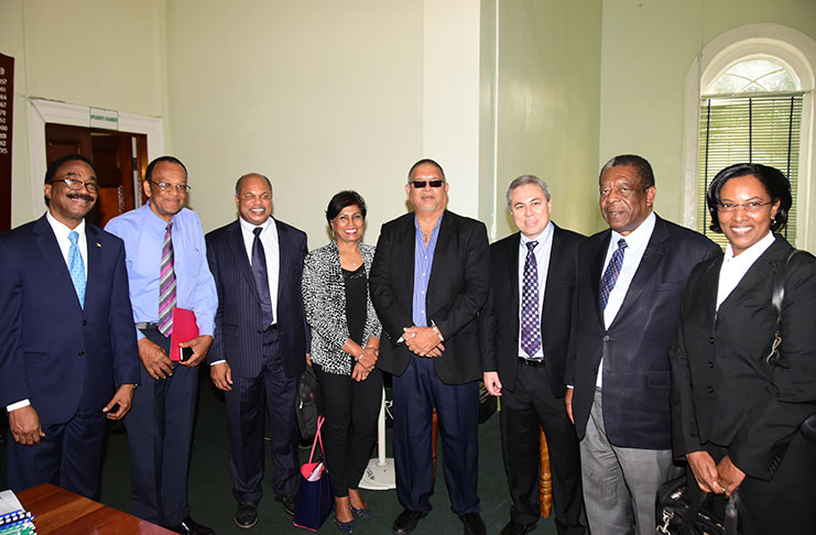 Attorney General and President of the Caribbean Court of Justice Sir Dennis Byron along with his team