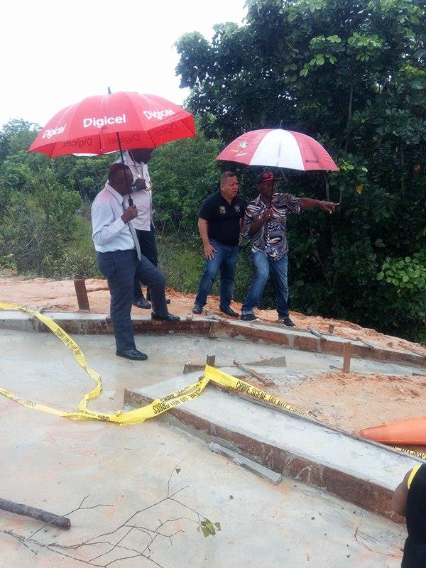 Region 10 Chairman,Renis Morian,and Councillors inspecting corrective works on the breakage at Kairuni on the Linden/Soesdyke Highway