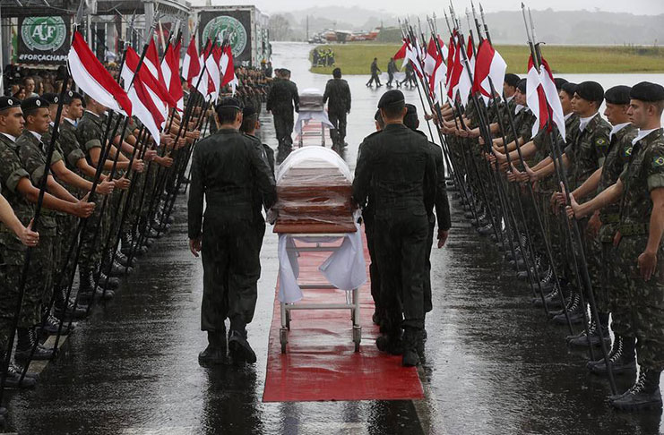 The coffins of the Chapecoense soccer team members, who died in a plane crash in northwestern Colombia last week