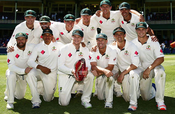 Aussie players pose with the trophy after they beat Pakistan 3-0 in the series on the 5th day in Sydney.