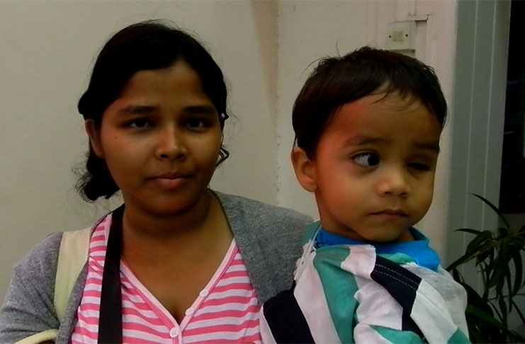 Little Omkar Persaud and his mother, Casandra Persaud