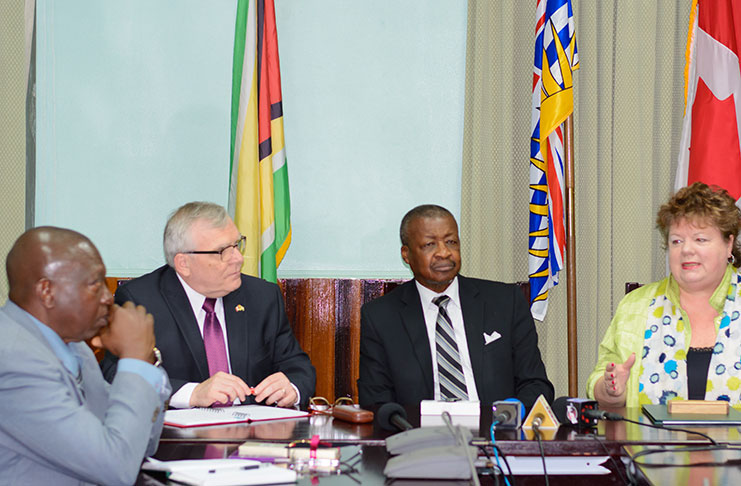 Speaker of the Legislative Assembly of the Province of British Columbia, Linda Reid makes a point in the presence of Speaker of the National Assembly of Guyana, Dr. Barton Scotland, Canadian High Commissioner to Guyana and Suriname, Pierre Giroux and Clerk of the National, Sherlock Isaacs