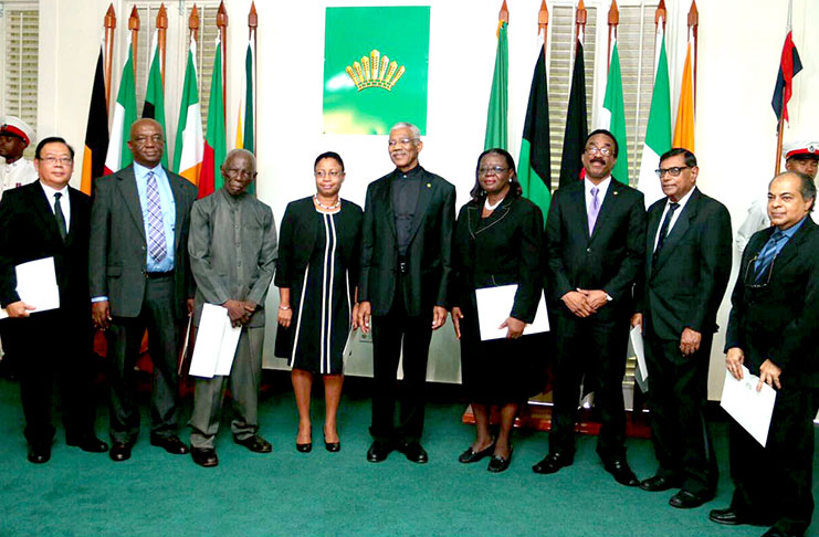 President Granger flanked by the new newly appointed Senior Counsel. On his left they are Charles Fung-A-Fat, Neil Boston, Llewelyn John and Justice Alison Roxane McLean George-Wiltshire. On his right are: Rosalie Althea Robertson, Minister Basil Williams, Vidyanand Persaud and Rafiq Turhan Khan