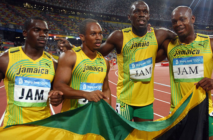 (L-R) Nesta Carter, Michael Frater, Usain Bolt and Asafa Powell celebrate Jamaica's 4x100m relay victory in 2008. (GettyImages)