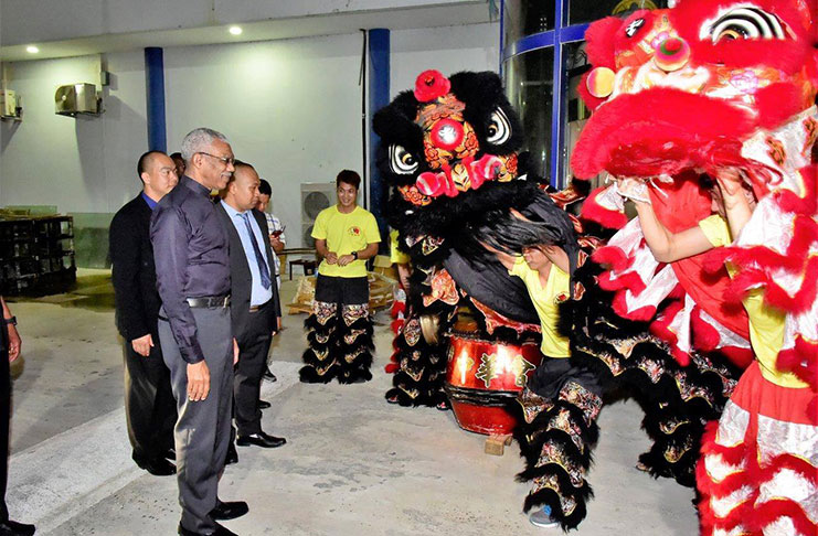 President David Granger, on Monday evening, attended the Chinese Association of Guyana’s Chinese New Year and Spring Festival Dinner and Cultural Performance, held at the New Thriving Chinese Restaurant at Providence, East Bank Demerara. Here, he is pictured observing the Chinese Dragon Dance, which was on display upon his arrival.